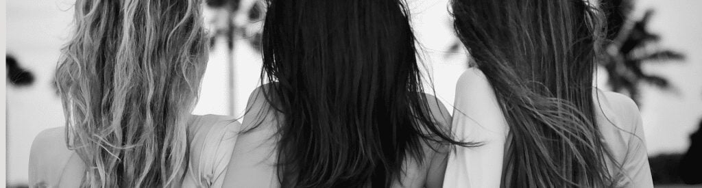 empowering women image of three women linked